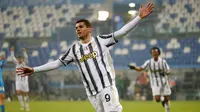 Striker Juventus, Alvaro Morata, melakukan selebrasi mencetak gol ke gawang Napoli pada laga final Piala Super Italia di Stadion Mapei, Rabu (20/1/2021). Juventus menang dengan skor 2-0. (Massimo Paolone/LaPresse via AP)