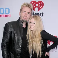 Keretakan yang terjadi pada rumah tangga Avril Lavigne dan vokalis grup band Nickelback, Chad Kroeger tidak menyurutkan semangat mereka dalam bermusik. (AFP/Bintang.com)