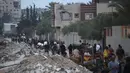 Selain itu, pemerintah di Jalur Gaza juga menekankan komitmen untuk melindungi bantuan dari pencurian, kekacauan, atau penyimpangan, serta menjamin penyaluran sesuai protokol Perserikatan Bangsa Bangsa (PBB). (Eyad BABA/AFP)