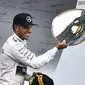 Lewis Hamilton ekspresikan kemenangan di Belgia (JOHN THYS / AFP)