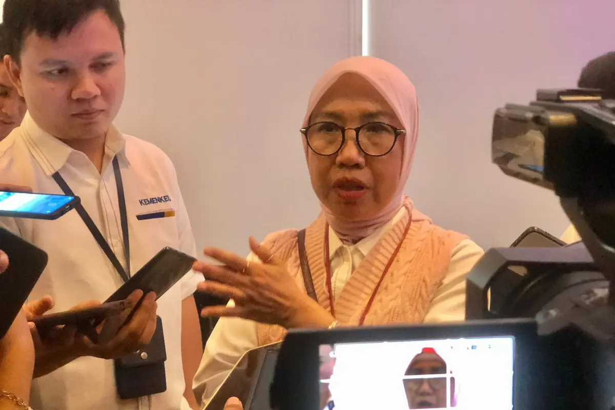 Direktur Penyuluhan, Pelayanan, dan Hubungan Masyarakat Direktorat Jenderal Pajak (DJP) Kementerian Keuangan Dwi Astuti, dalam media briefing Update Kebijakan Perpajakan Terkini, di Kantor DJP, Senin (8/1/2024). (Tira/Liputan6.com)