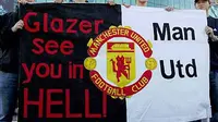 Protes para fans MU terhadap takeover Malcolm Glazer pada 2005.