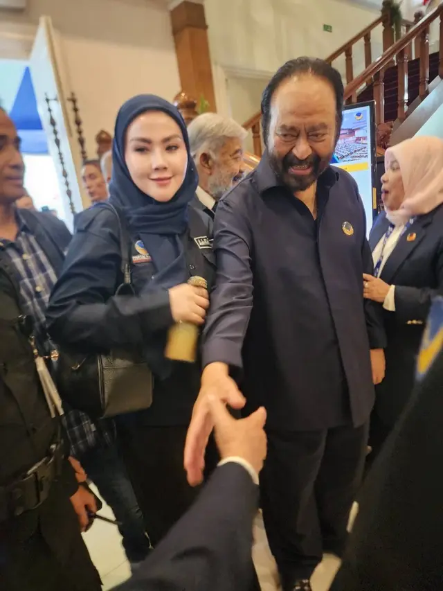 Ade Fitrie Kirana bersama Surya Paloh