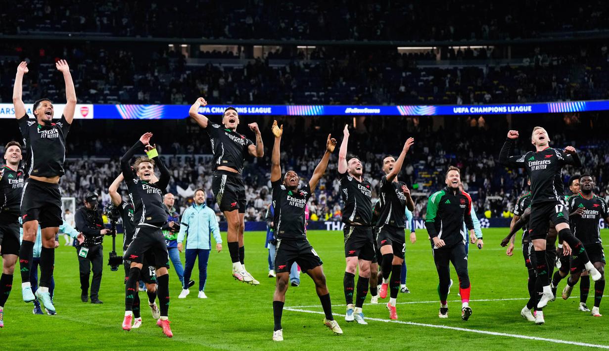 Kemenangan ini membuat Arsenal unggul atas Real Madrid dengan agregat 5-1 setelah di leg pertama menang 3-0. (AP Photo/Manu Fernandez)