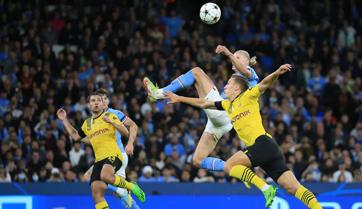 Erling Haaland berhasil membawa kemenangan untuk Manchester City saat menghadapi mantan klubnya, Borussia Dortmund pada laga Grup G Liga Champions 2022/2023 yang berlangsung di Etihad Stadium, Kamis (15/9/2022) dini hari WIB. (AFP/Lindsey Parnaby)