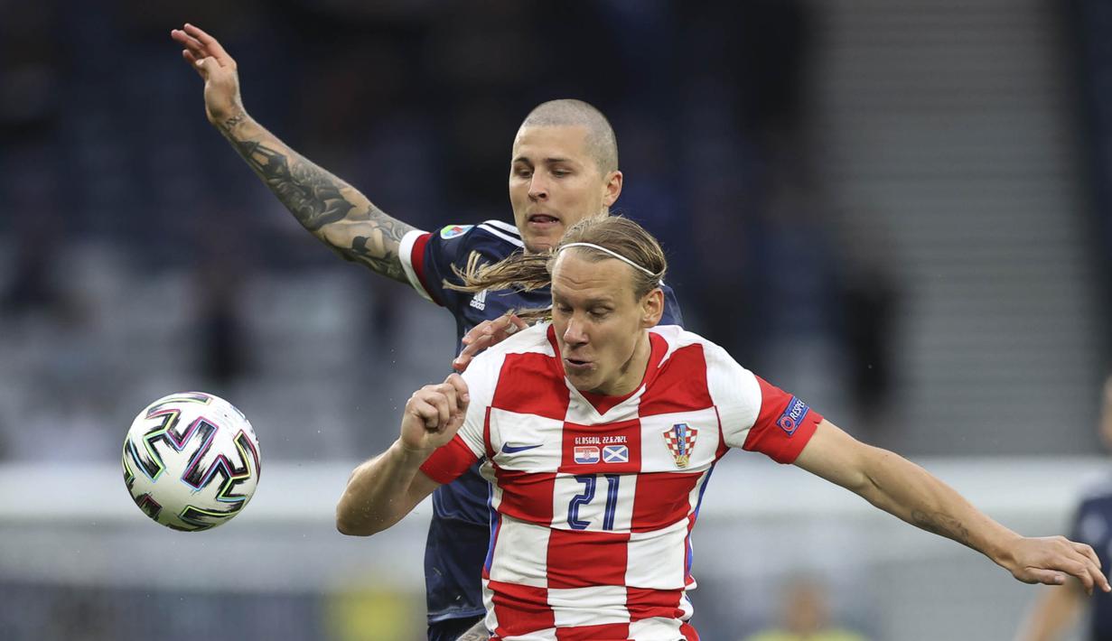 Kroasia menurunkan tempo di 10 menit akhir pertandingan. Tidak ada gol tambahan. Wasit pun meniup peluit panjang. Skor 3-1 untuk kemenangan Kroasia membuat Skotlandia harus angkat koper lebih cepat. (Foto: AP/Pool/Lee Smith)