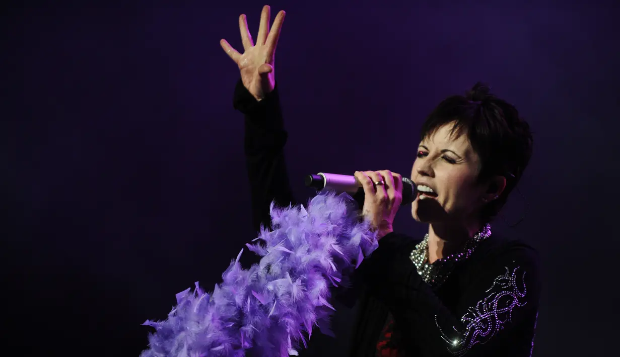 Pada saat dipenjara, Dolores O'Riordan mengaku sempat mencoba untuk overdosis namun ia masih teringat harus menjaga anak-anaknya. (MIGUEL GUTIERREZ / AFP)