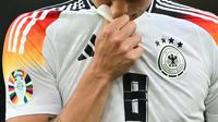 Saat ini, gelandang Die Mannschaft tersebut sudah berusia 34 tahun. (Fabrice COFFRINI/AFP)