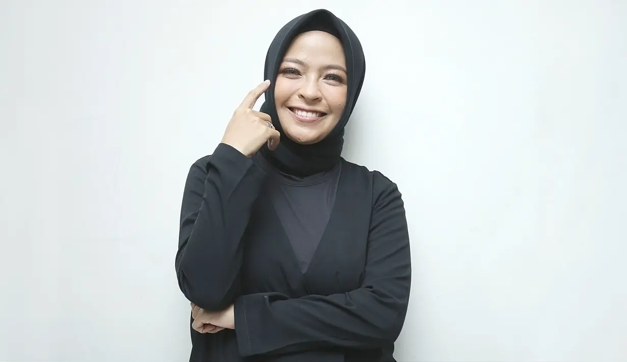 Tantri Kotak di acara Joox Karaoke Superstar. (Bambang E Ros/Fimela.com)
