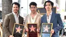 <p>(kiri ke kanan) Kevin Jonas, Nick Jonas, dan Joe Jonas dari Jonas Brothers berpose pada upacara penganugerahan bintang Hollywood Walk of Fame di Los Angeles, Amerika Serikat, 30 Januari 2023. Bintang penghormatan terhadap Jonas Brothers berada di sekitar musikus hebat lainnya seperti Elvis Presley dan The Beatles. (Photo by Jordan Strauss/Invision/AP)</p>