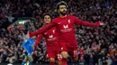 Pemain Liverpool, Mohamed Salah merayakan gol pembuka timnya selama pertandingan sepak bola Liga Premier Inggris antara Liverpool dan Manchester City di Stadion Anfield, Liverpool, Minggu (16/10/2022). Gol tunggal Mohamed Salah sudah cukup memberikan kemenangan 1-0 bagi The Reds. (Peter Byrne/PA via AP)