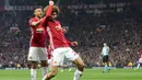 Gelandang Manchester United, Marouane Fellaini melakukan selebrasi usai mencetak gol ke gawang Celta Vigo pada leg kedua Liga Europa di stadion Old Trafford, Inggris,(11/5). MU melaju ke final usai menang dengan aggregat 2-1. (AFP Photo/Miguel Riopa)