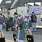 Jemaah Calon Haji berangkat dari Bandara Juanda. (Dian Kurniawan/Liputan6.com)