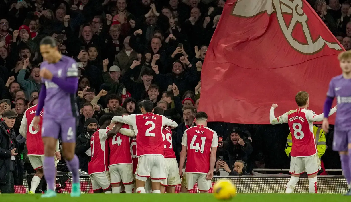 Sementara, Arsenal naik ke posisi kedua dengan 49 poin dari 23 laga yang sudah dimainkan. (AP Photo/Kin Cheung)
