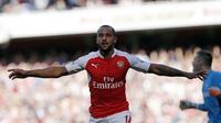 YAKIN - Penyerang Arsenal, Theo Walcott, yakin tahun ini akan menjadi masa-masa kesuksesan Arsenal. (AFP/ADRIAN DENNIS).
