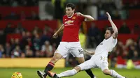 Manchester United's Matteo Darmian in action with Swansea's Angel Rangel Reuters / Andrew Yates