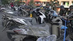 Jumlah korban jiwa akibat banjir di Bali terus bertambah menjadi 16 orang, sementara satu lainnya masih dinyatakan hilang. (AP Photo/Firdia Lisnawati)