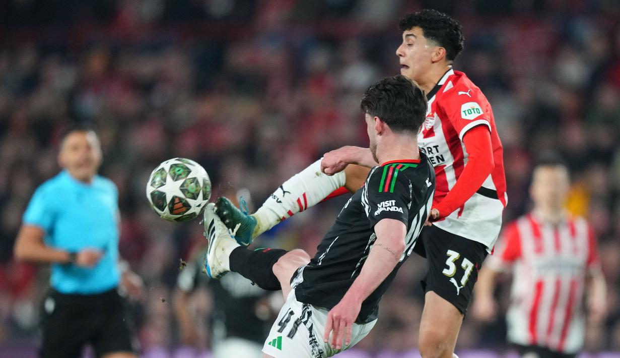 Arsenal mencatatkan kemenangan besar 7-1 atas PSV Eindhoven. Ini menjadi kemenangan terbesar dalam sejarah babak 16 besar Liga Champions. (AP Photo/Peter Dejong)