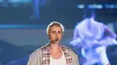 Sikap Justin kali ini nampaknya bukan kesalahan Justin seutuhnya. Bisa dibilang dirinya tak sengaja melakukan hal itu lantaran kaget dengan kehadiran fansnya yang mencondong ke dalam mobilnya. (AFP/Bintang.com)