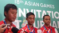 Pepanah muda Indonesia, Avianto Bagas Prasetyadi mengaku tertekan karena bermain satu tim dengan pemain senior, Riau Ega Agata Salsabilla pada test event Asian Games 2018. (Bola.com/Zulfirdaus Harahap)