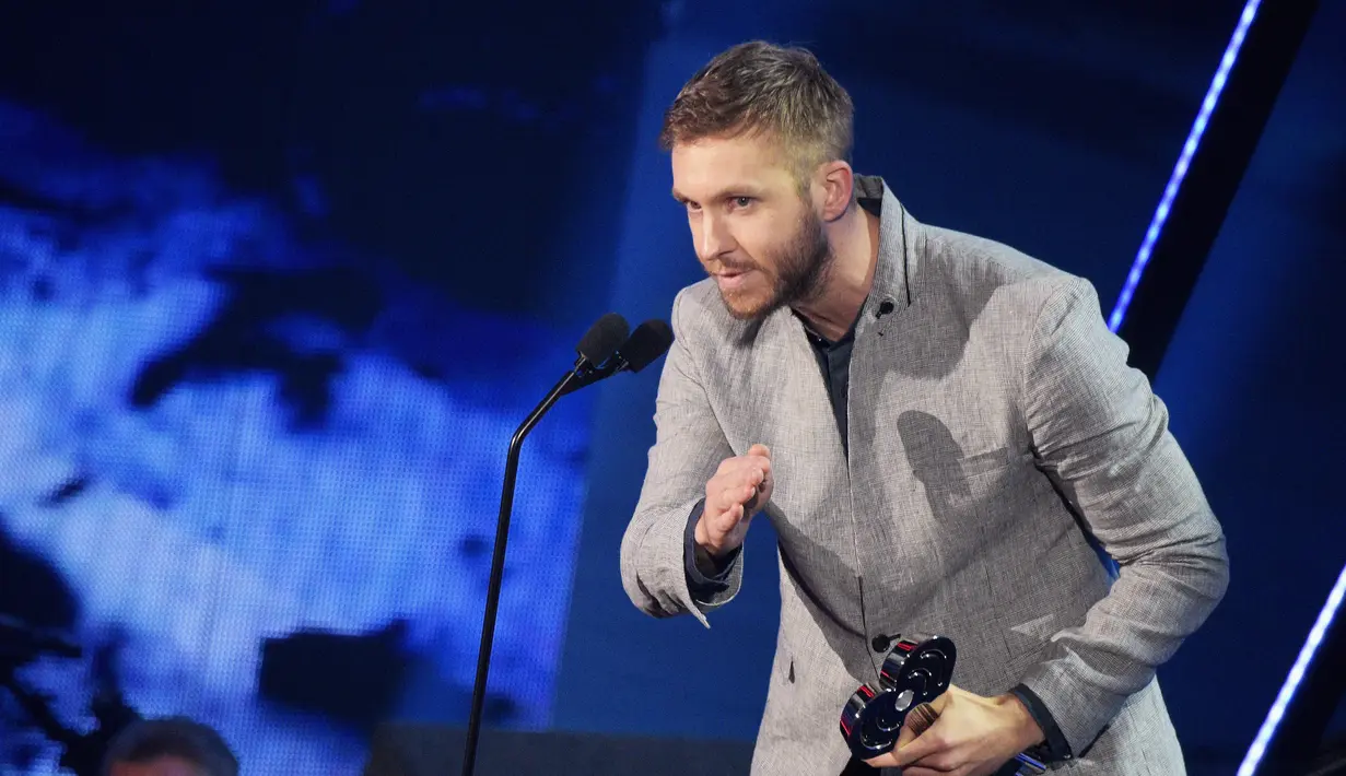 Tak hanya itu saja, sikap Calvin Harris yang selalu menunjukan jika dirinya lebih berpihak pada tim Kimye (Kim dan Kanye). Secara tak langsung, Dj asal Skotlandia ini memilih pihak Kim Kardashian. (AFP/Bintang.com)