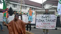 Pegiat antikorupsi dan pendongeng keliling mengecam serangan terhadap penyidik KPK (Zainul Arifin/Liputan6.com) 