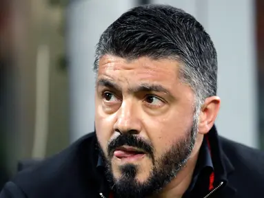 Ekspresi pelatih AC Milan, Gennaro Gattuso saat pertandingan antara AC Milan melawan Arsenal pada leg pertama 16 besar Liga Europa, di San Siro, Milan, Italia, Kamis (8/3). AC Milan takluk 0-2 dari Arsenal. (AP Photo/Luca Bruno)