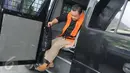 Tersangka Deputi Bidang Informasi Hukum dan Kerja Sama Badan Keamanan Laut (Bakamla), Eko Susilo Hadi kembali menjalani pemeriksaan di gedung KPK, Jakarta, Jumat (13/1). (Liputan6.com/Helmi Afandi)