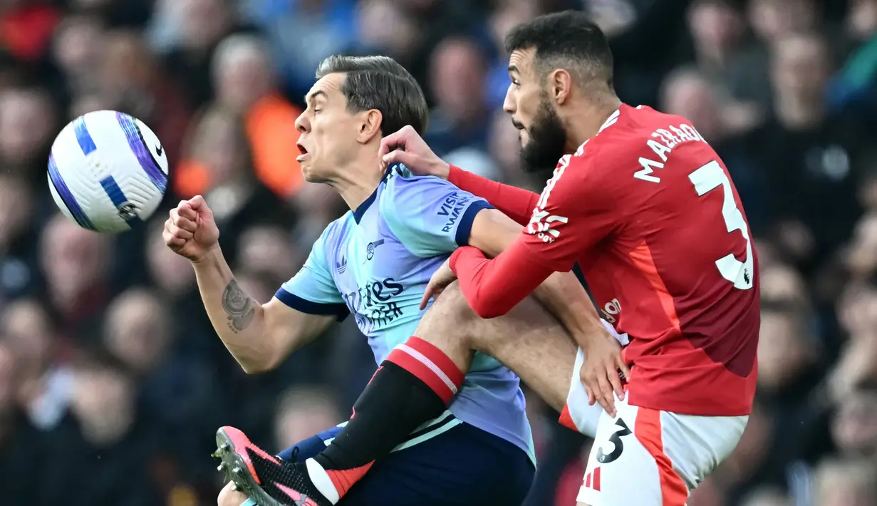 Menjamu Arsenal di Stadion Old Trafford, Manchester United ditahan imbang 1-1. (Paul ELLIS/AFP)