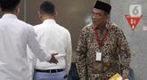 Penasihat Khusus Presiden Bidang Haji, Muhadjir Effendy, sesaat setelah tiba di Gedung Merah Putih Komisi Pemberantasan Korupsi (KPK), Jakarta, Senin (18/5/2026). (Liputan6.com/Helmi Fithriansyah)