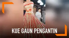 Seorang pembuat roti menciptakan kue menakjubkan di China. Ia mengubah sebuah kue besar dan cantik menyerupai gaun pengantin.