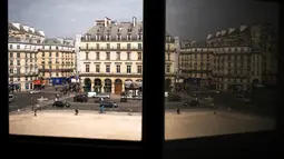 Pemandangan jalan Rivoli terlihat dari gambar yang diambil di balik jendela museum Louvre di Paris, 16 Mei 2016. (LIONEL Bonaventure/AFP)