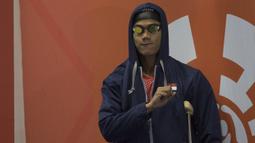 Perenang Indonesia, Jendi Pangabean, bersiap tampil pada Asian Para Games cabang renang nomor 100 meter gaya punggung S9 di Stadion Aquatic, Jakarta, Kamis (11/10). (Bola.com/Vitalis Yogi Trisna)