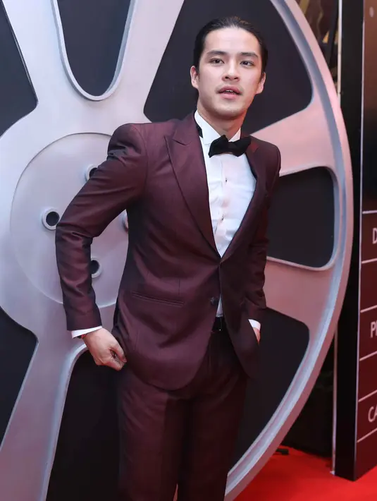 "Kangen lah kangen, pasti. Saya dari dunia nyanyi, cuman sekarang kan lagi banyak tanggung jawab di dunia film. Doain aja semuanya bisa cepat," kata Morgan Oey. (Nurwahyunan/Bintang.com)