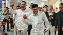 Ridwan Kamil dan Suswono merupakan pasangan kedua dari tiga bakal calon gubernur dan wakil gubernur yang akan menjalani pemeriksaan kesehatan sebagai syarat mengikuti kontestasi Pemilihan Gubernur (Pilgub) DKI Jakarta. (Liputan6.com/Angga Yuniar)