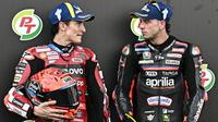 Marc Marquez dan Marco Bezzecchi pada balapan MotoGP 2026. (Lillian SUWANRUMPHA / AFP)