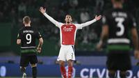 Selebrasi pemain Arsenal ketika mencukur Sporting di Liga Champions (AFP)