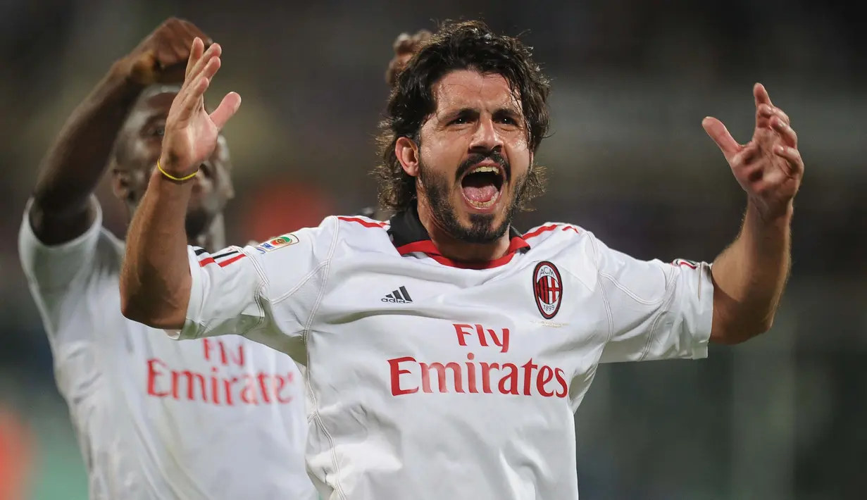 Gennaro Gattuso merupakan sosok pejuang keras di lini tengah AC Milan.  Dengan gaya khas ngototnya ia menjadi salah satu pilar tangguhnya lini tengah Rossoneri kala itu. (AFP/Alberto Lingria)