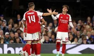 Max Dowman merayakan gol ketiga Arsenal saat menghadapi Ipswich Town pada pertandingan putaran ketiga Carabao Cup di Portman Road, Ipswich, Inggris, Selasa (15/9/2026).
 (Adrian Dennis / AFP)