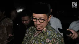 Menteri Agama Lukman Hakim Saifuddin tiba di Kantor Kementerian Agama, Jakarta, Senin (18/3). KPK menggeledah ruang kerja Lukman Hakim terkait kasus suap jual beli jabatan yang melibatkan mantan Ketua Umum PPP Romahurmuziy. (merdeka.com/Iqbal S. Nugroho)