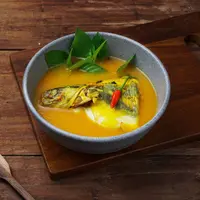 ilustrasi resep ikan kuah kuning/ferigrinjoe/Shutterstock