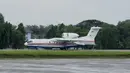 Penampakan pesawat dari Rusia yang ikut membantu pencarian AirAsia QZ8501, Lanud Halim Perdanakusuma, Jakarta, Minggu (4/1/2015). (Liputan6.com/Andrian M Tunay)