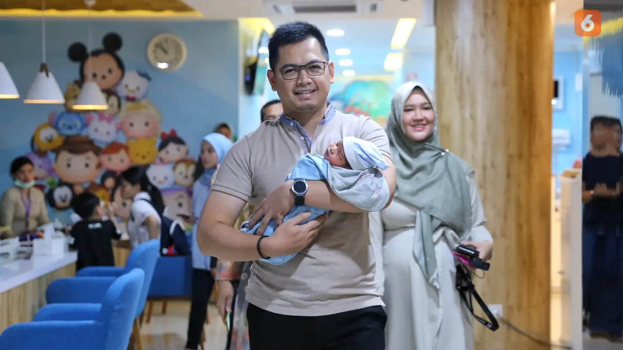 [Fimela] Tommy Kurniawan dan Lisya Nurrahmi