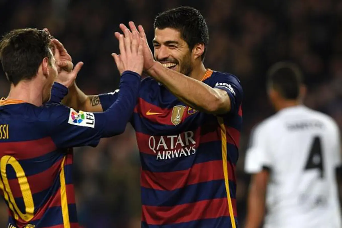 Lionel Messi dan Luis Suarez
