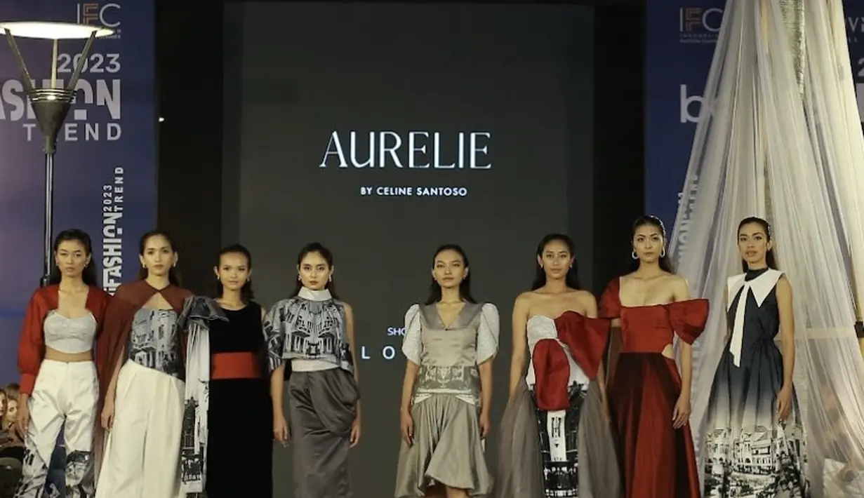Aurelie by Celine Santoso meluncurkan koleksi bertema bluemarine, yang terinspirasi dari lautan biru dan warna awan yang putih. Memiliki konsep ressort wear yang santai namun elegan, dibuat dari kain chiffon dengan warna biru dan putih dan dihiasi accesories mutiara. [Credit: IFC]