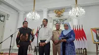 Pj Gubernur DKI Jakarta Heru Budi Hartono mengumumkan UMP Jakarta 2024 pada Selasa (21/11/2023). ( Merdeka.com/ Lydia Fransisca)