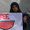 Para aktivis pro-Palestina mengambil bagian dalam aksi protes terhadap tindakan Israel di Gaza, di Banda Aceh pada 18 Mei 2024. (CHAIDEER MAHYUDDIN/AFP)