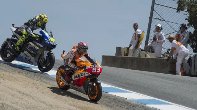 Foto: Kilas Balik, 5 Persaingan Terpanas Rossi dan Marquez di Ajang MotoGP