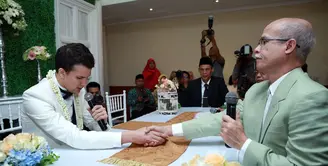 Prosesi Akad Nikah Risty Tagor & Stuart Collin, berlangsung di Hotel Novotel Bogor, Jawa Barat, Minggu (19/4)