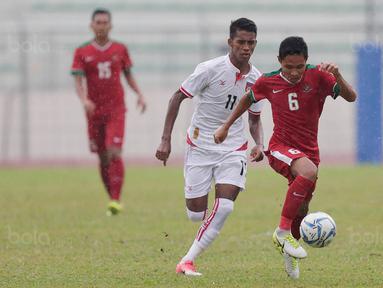 Gelandang Timnas Indoneisa, Evan Dimas mencetak satu gol saat melawan Myanmar pada Laga Sea Games 2017 di Stadion MPS, Selangor, Selasa (29/8/2017). Indonesia menang 3-1 atas Myanmar. (Bola.com/Vitalis Yogi Trisna)